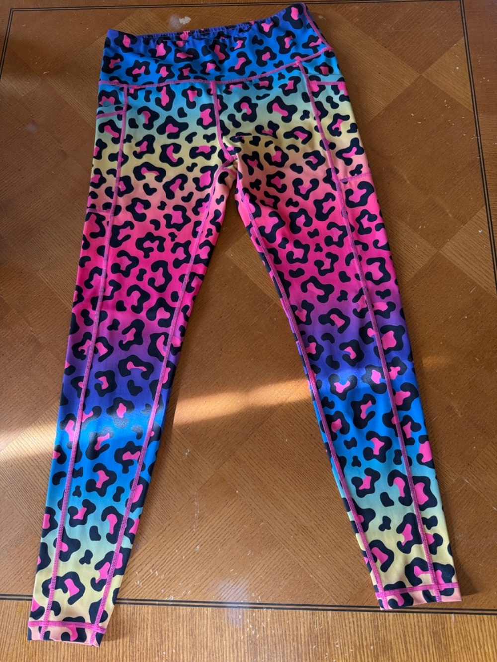 Constantly Varied Gear women’s Rainbow Leopard Print Leggings - Pink Blue Yellow